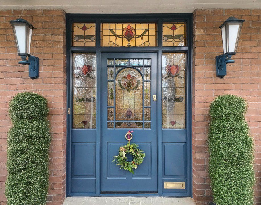 Handcrafted timber door and stained glass windows design