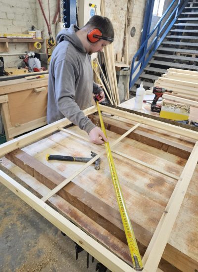 Measuring bespoke timber window frames to fit the design