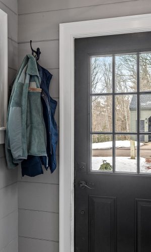 entryway-of-home-with-coats-and-exterior-view-2026-03-18-13-15-00-utc